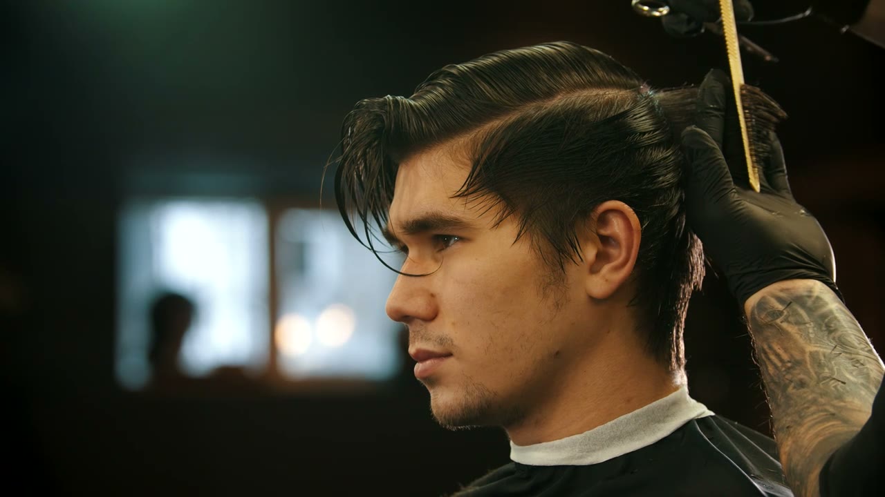 Client in profile with a fresh, styled haircut